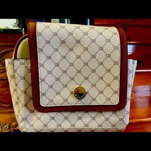 Steve Madden shoulder by with removable piece. Tan with removable black strap.